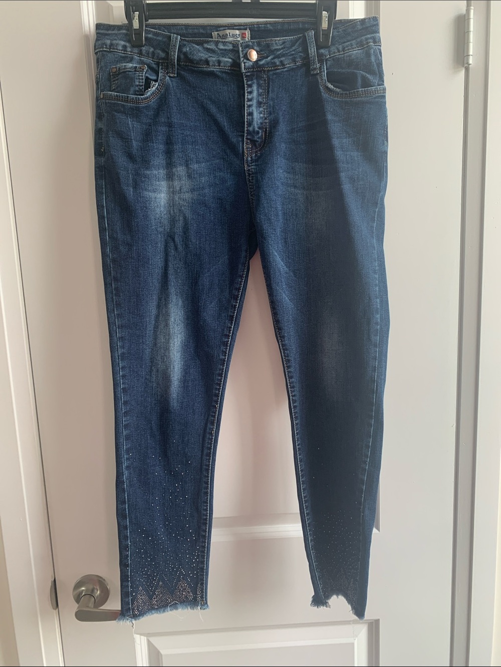 Dark Blue Womenโs Jeans with Embellished Hem -